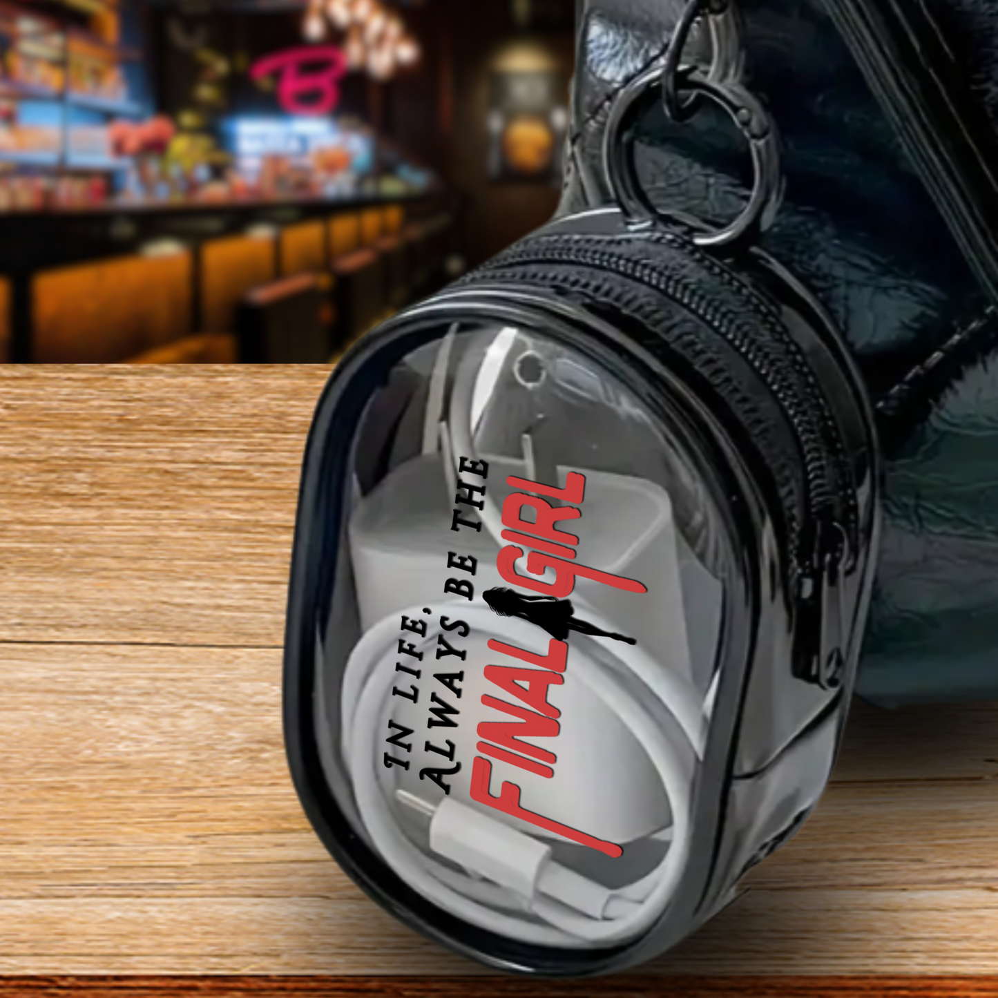 Final Girl Mini Stash Case – Clear Zip Pouch with Horror Final Girl Design, Compact Storage for Small Essentials, Earbuds, Coins & More